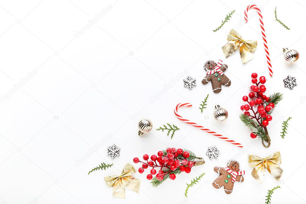 Christmas ornaments with gingerbread cookies on white background