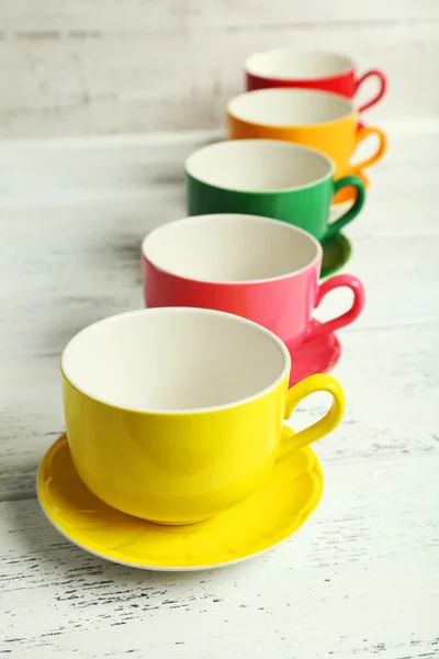 Colorful cups on white background — Stock Photo, Image