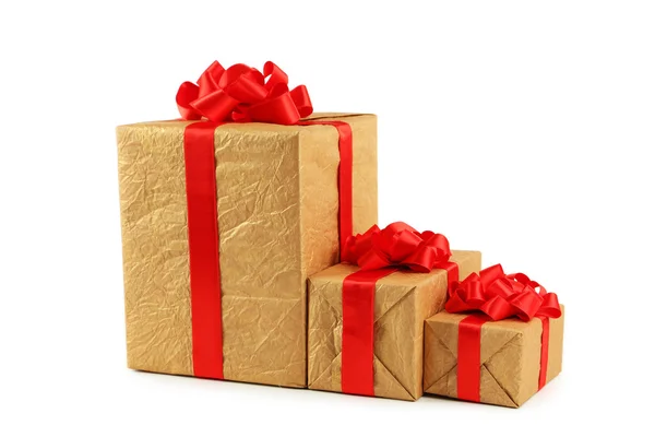 Cajas de regalo con lazos rojos — Foto de Stock