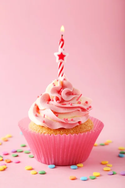 Tasty cupcake with candle — Stock Photo, Image