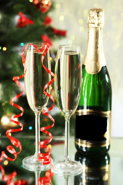 Glasses of champagne with bottle — Stock Photo, Image