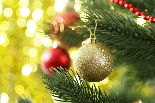 Christmas baubles on christmas tree — Stock Photo, Image