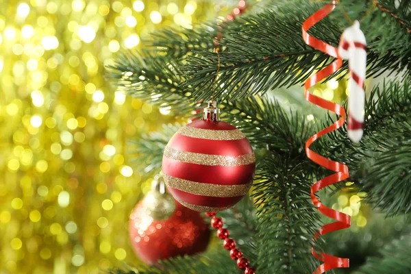 Christmas baubles on christmas tree — Stock Photo, Image