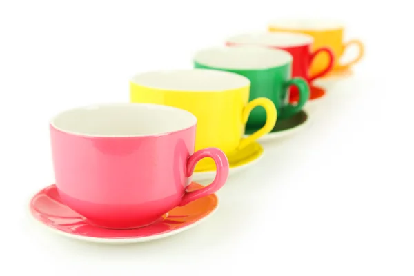 Colorful cups and saucers — Stock Photo, Image