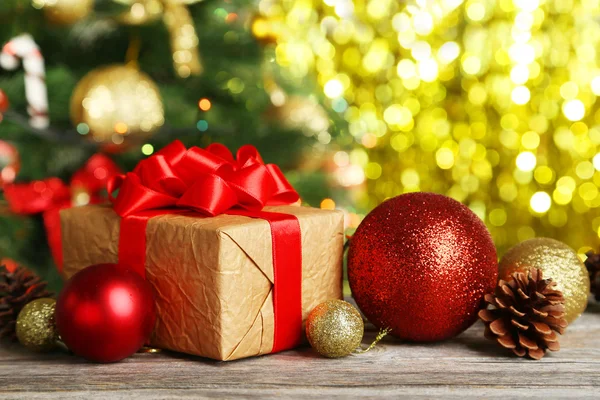 Christmas balls and gift — Stock Photo, Image