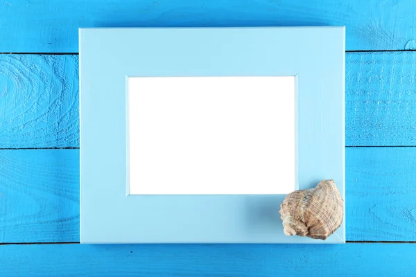 Wood frame and seashell — Stock Photo, Image