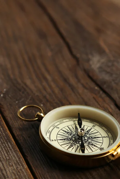 Compass on wooden background — Stock Photo, Image