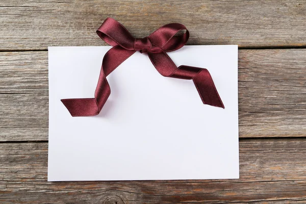 Blank paper sheet with bow Stock Image