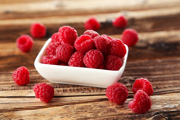 Raspberries in bowl Royalty Free Stock Photos