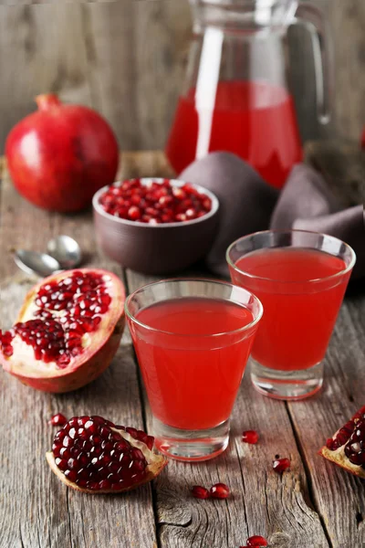 Pomegranate juice in glasses — Stock Photo, Image