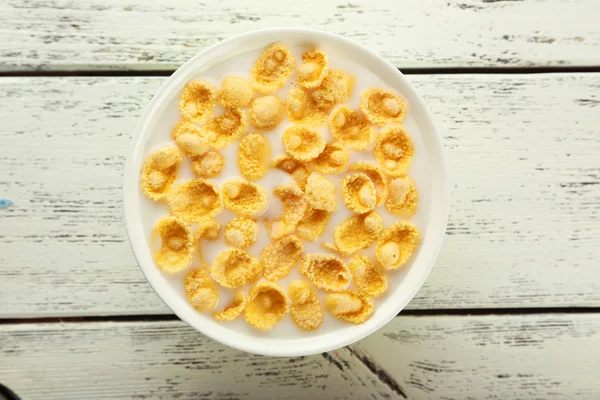 Bowl of cornflakes with milk — Stock Photo, Image