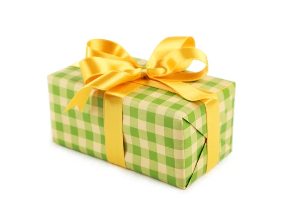 Confezione regalo con fiocco dorato — Foto Stock