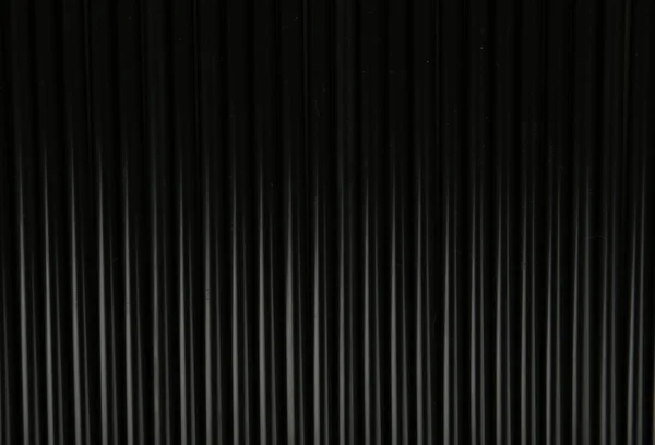 Фон из черных соломинок — стоковое фото