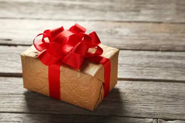 Gift box with red bow — Stock Photo, Image