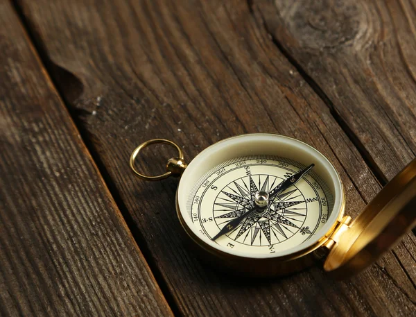 Compass on wooden background — Stock Photo, Image