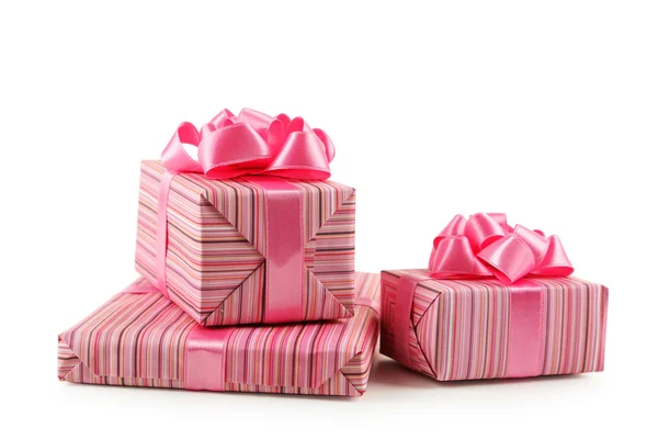Ajándék dobozok, rózsaszín íjak — Stock Fotó