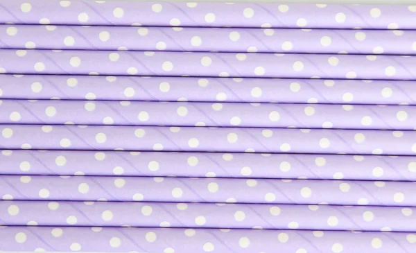 Фиолетовые соломинки для коктейлей — стоковое фото
