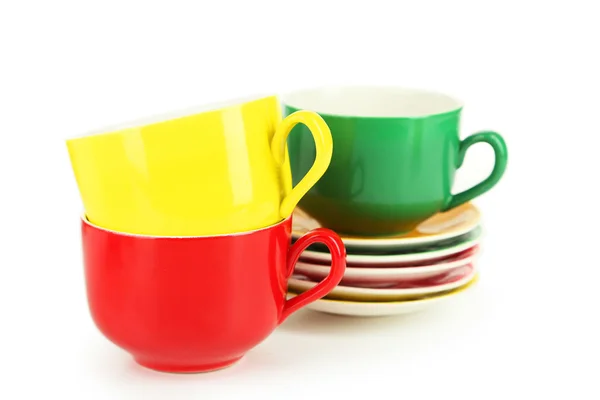 Colorful cups and saucers — Stock Photo, Image