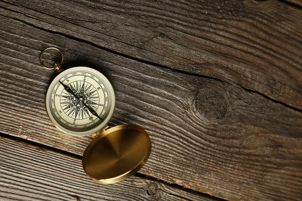 Compass on wooden background — Stock Photo, Image