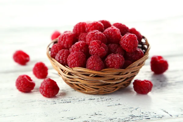 Raspberries in basket — Stock Photo, Image