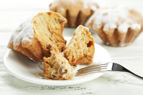 Sweet cupcake on plate — Stock Photo, Image