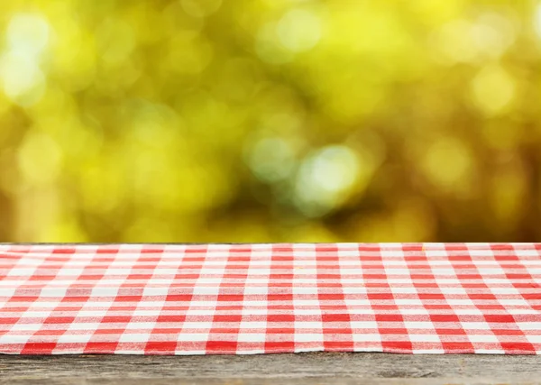 Wooden table and napkin — Stock Photo, Image