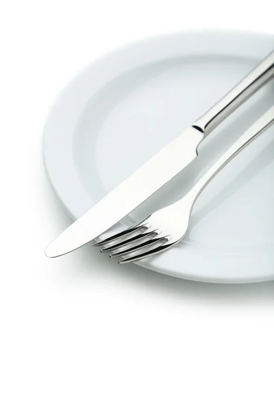 Vidlička, nůž a deska — Stock fotografie