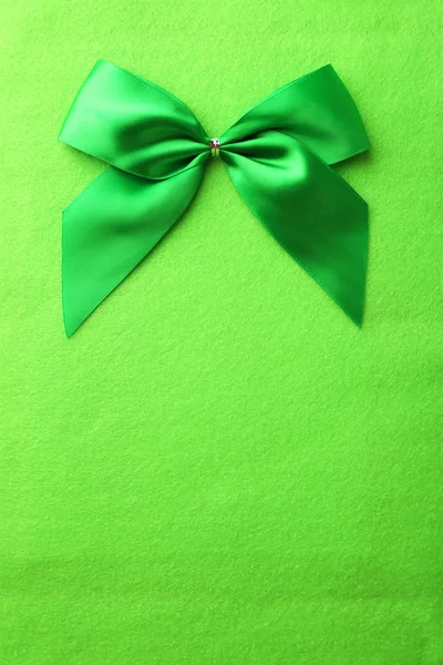 Green bow on background — Stock Photo, Image