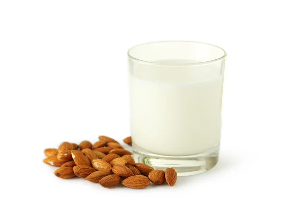 Vaso de leche con almendras — Foto de Stock