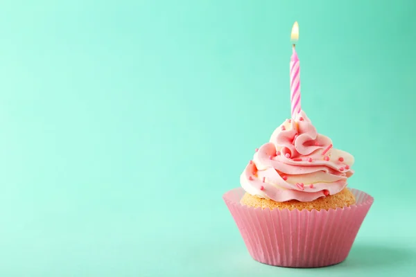 stock image Tasty cupcake with candle