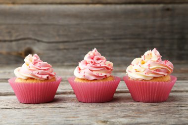 Tasty sweet cupcakes clipart