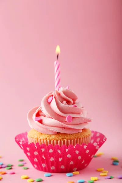 Tasty sweet cupcake with candle — Stock Photo, Image