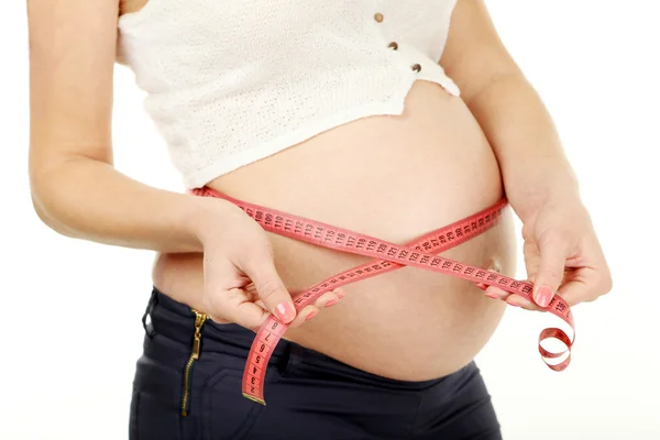 Misurazione del ventre con centimetro — Foto Stock