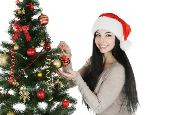 Nő Díszítő karácsonyfa — Stock Fotó