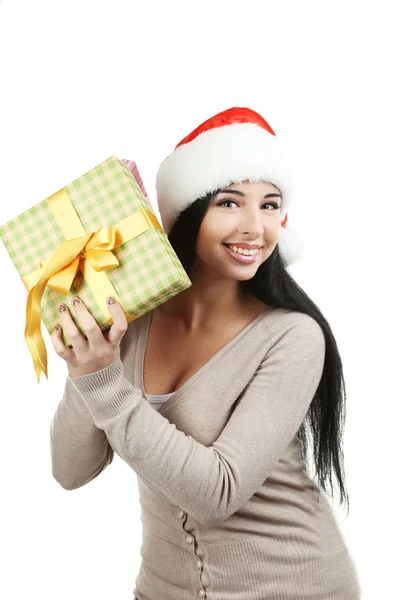 Женщина в рождественской шляпе с подарком — стоковое фото