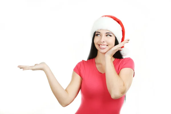 Жінка в різдвяному капелюсі тримає простір копіювання — стокове фото