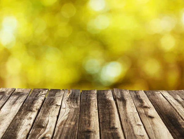 Hintergrund mit Holztisch — Stockfoto