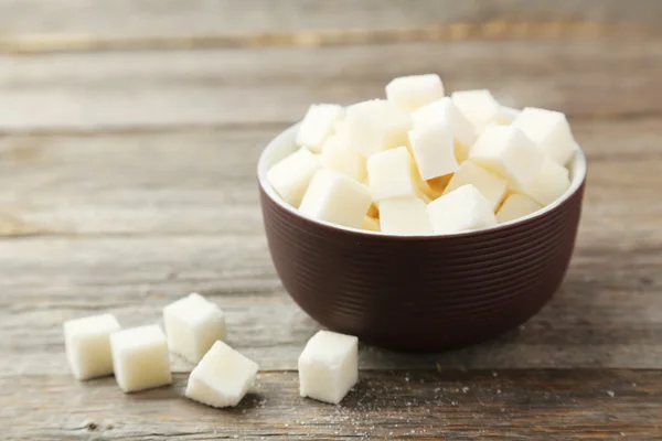 Sugar cubes in bowl — Stock Photo, Image