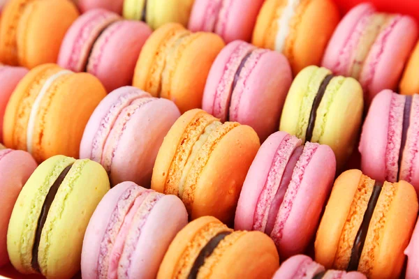 Ízletes macaroons háttér — Stock Fotó