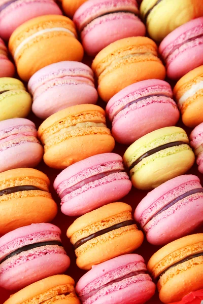 Ízletes macaroons háttér — Stock Fotó