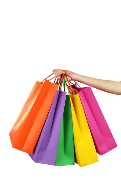 Mão segurando sacos de compras — Fotografia de Stock