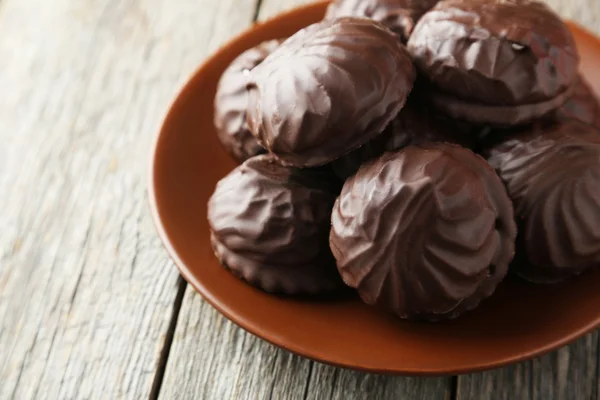 Zephyr in chocolate on plate — Stock Photo, Image