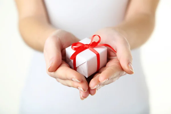 Hands holding gift box — Stock Photo, Image