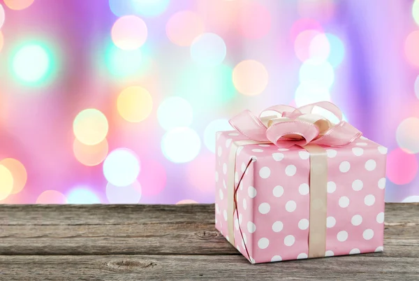 Gift box with pink bow — Stock Photo, Image
