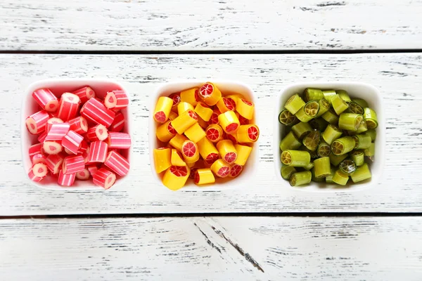 Colorful candies in bowls — Stock Photo, Image