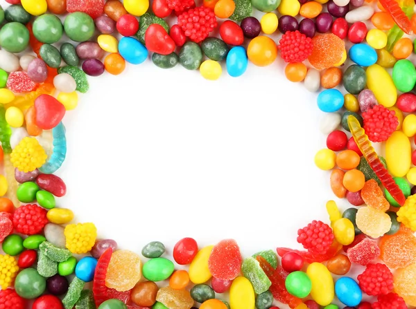Fargerike søtsaker på hvit bakgrunn – stockfoto