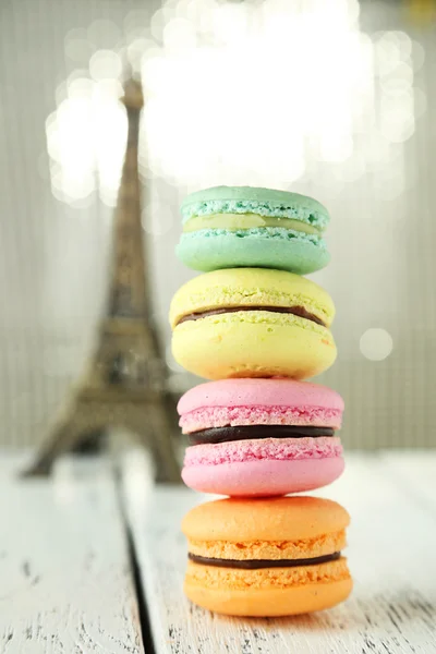 French colorful macarons on white wooden background — Stock Photo, Image