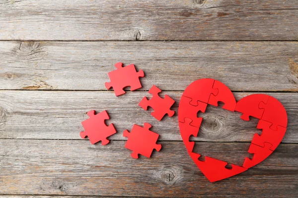 Red puzzle heart — Stock Photo, Image