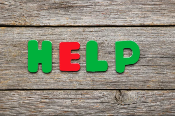 Help word made of colorful magnets — Stock Photo, Image