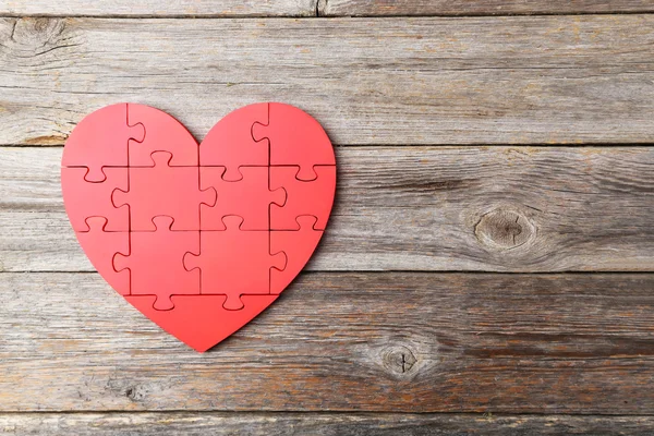 Coração de puzzle vermelho — Fotografia de Stock